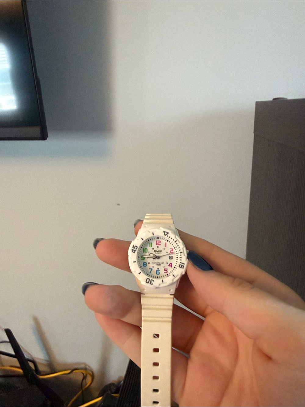 Casio White Watch with Multicolor Numerals